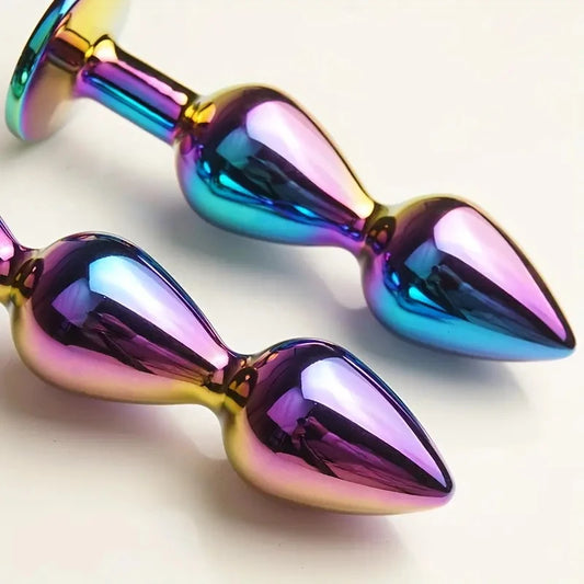 Masajeadores anales metálicos con joyas