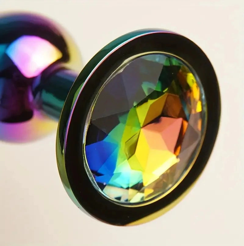 Masajeadores anales metálicos con joyas