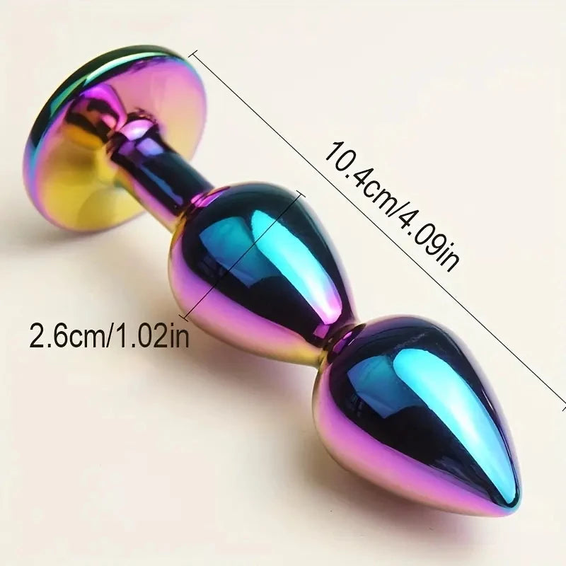 Masajeadores anales metálicos con joyas