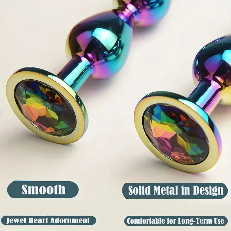 Masajeadores anales metálicos con joyas